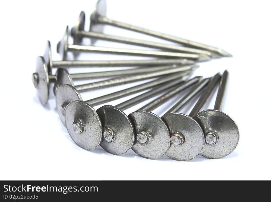 Large number of nails on a white background. Large number of nails on a white background