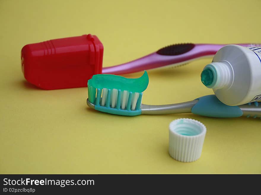 Tooth brush and tooth paste tube