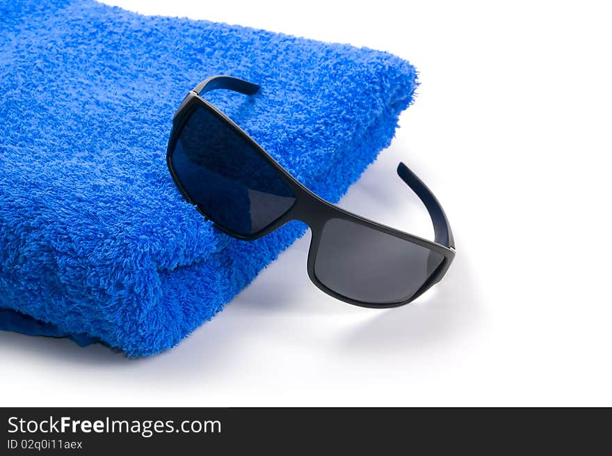 Towel and sunglasses