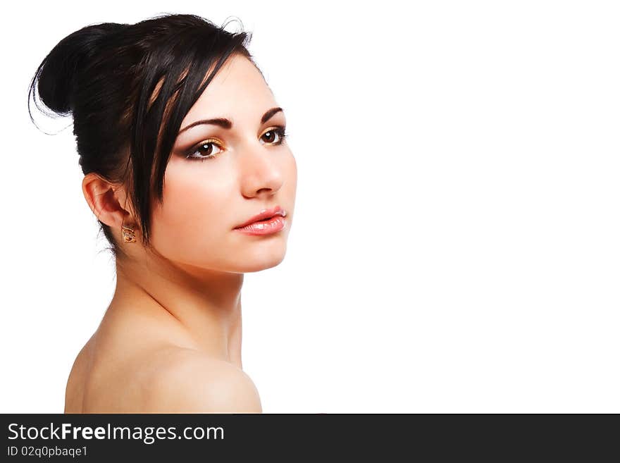 Portrait of young charming brunette woman on white background.