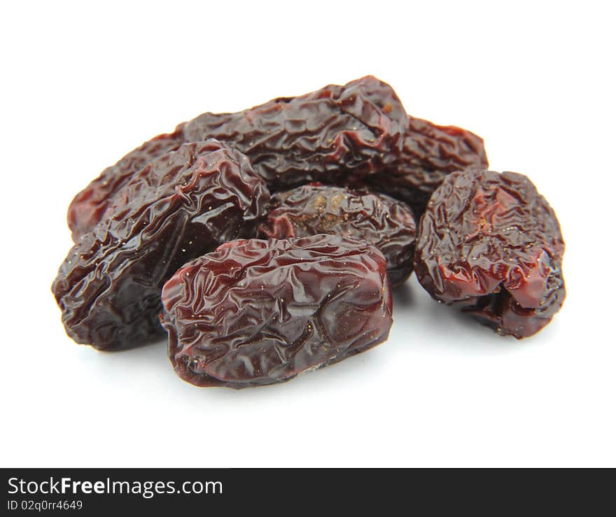 Close-up black jujube isolated in white. Close-up black jujube isolated in white