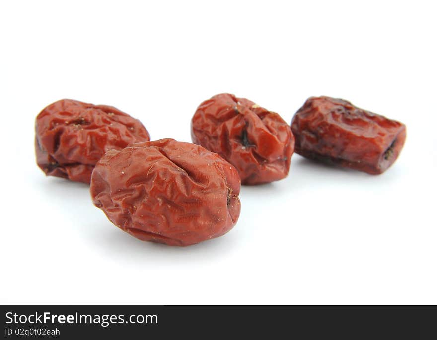 Close-up red jujube isolated in white