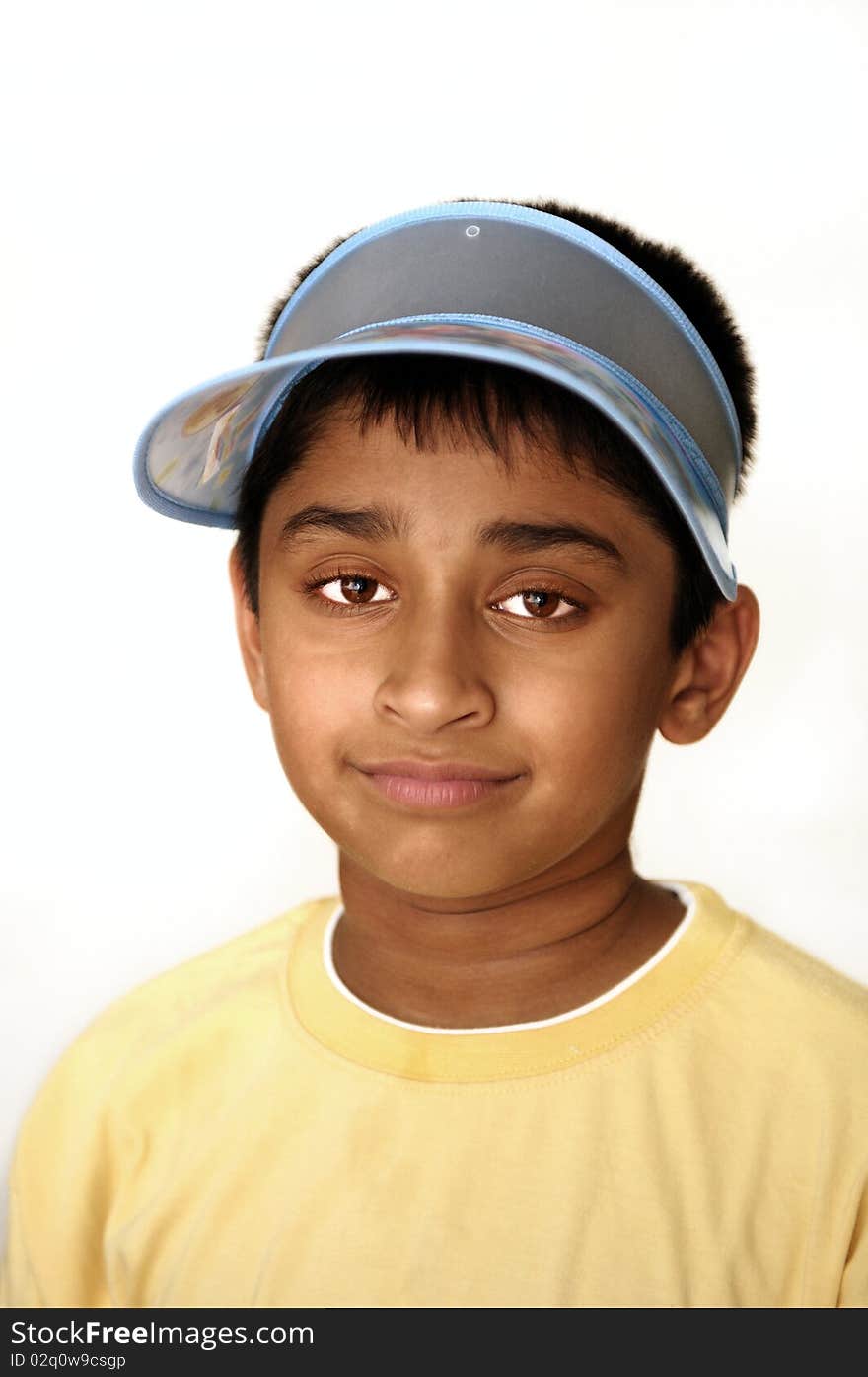 An handsome Indian kid smiling on the screen