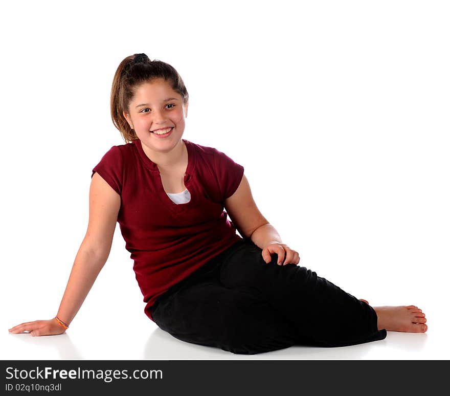 Portrait of a casually dressed happy, young preteen girl. Isolated on white. Portrait of a casually dressed happy, young preteen girl. Isolated on white.