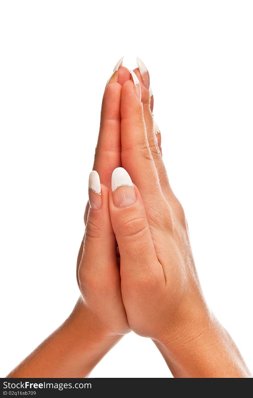 Beautiful woman's hands closed. Isolated on white background