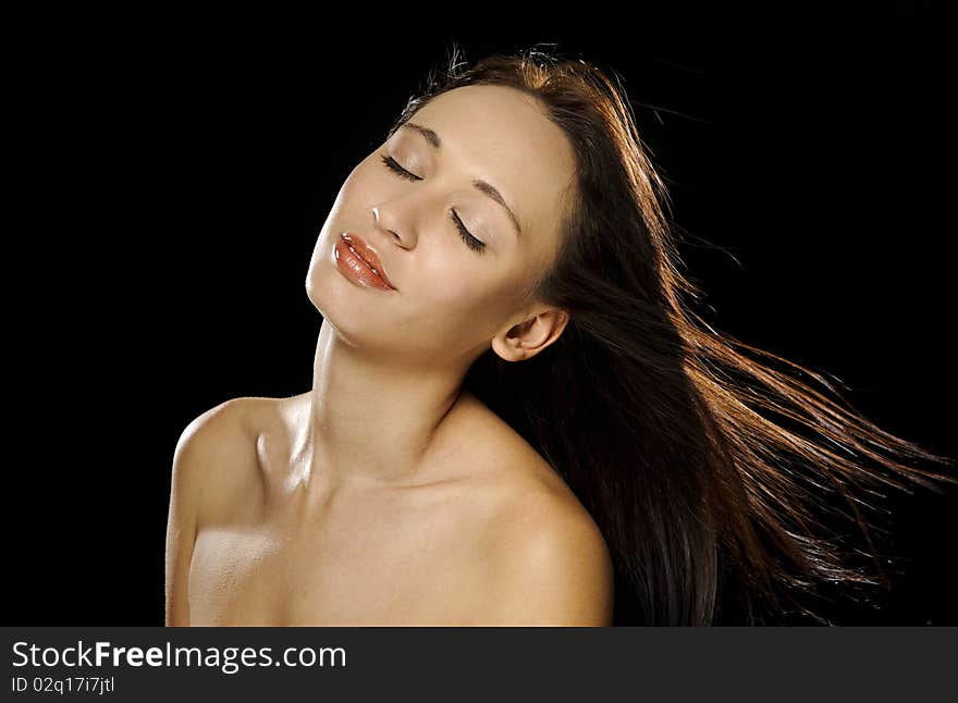 Attractive girl with perfect skin poses for a beauty portrait. Attractive girl with perfect skin poses for a beauty portrait