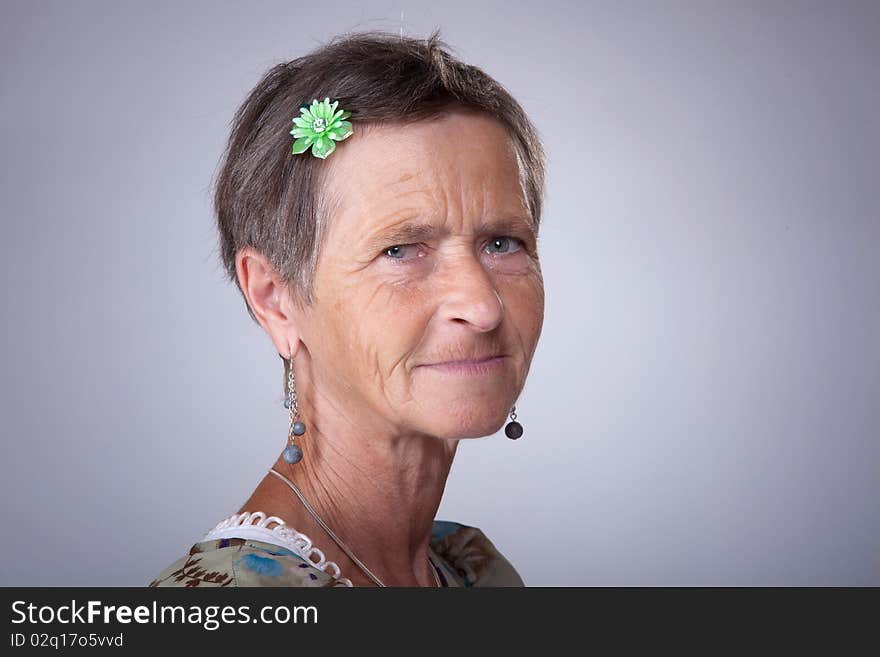 Mature woman head shot portrait. Mature woman head shot portrait