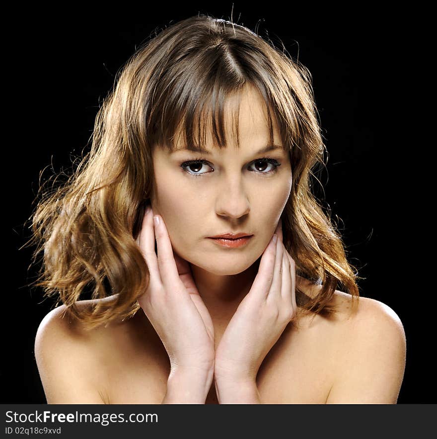 Attractive girl with perfect skin poses for a beauty portrait. Attractive girl with perfect skin poses for a beauty portrait