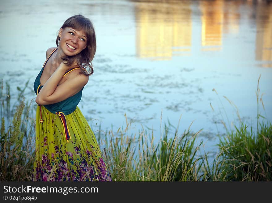 An attractive young woman walking on the lake. An attractive young woman walking on the lake