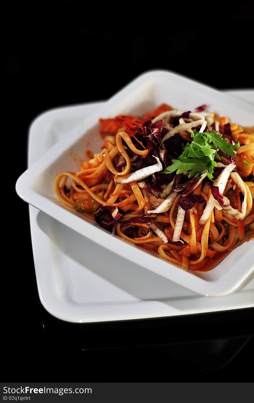 Pasta and cheese with tomatoes sauce and parsley