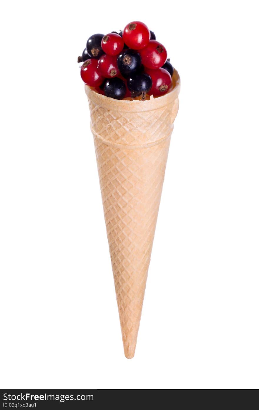 Black and red currant fruit in ice cream cone. Black and red currant fruit in ice cream cone