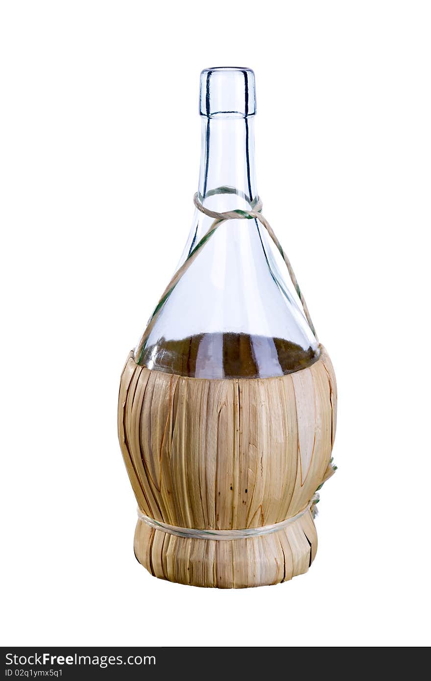 Straw-wrapped bottle with straw on a white background. Straw-wrapped bottle with straw on a white background