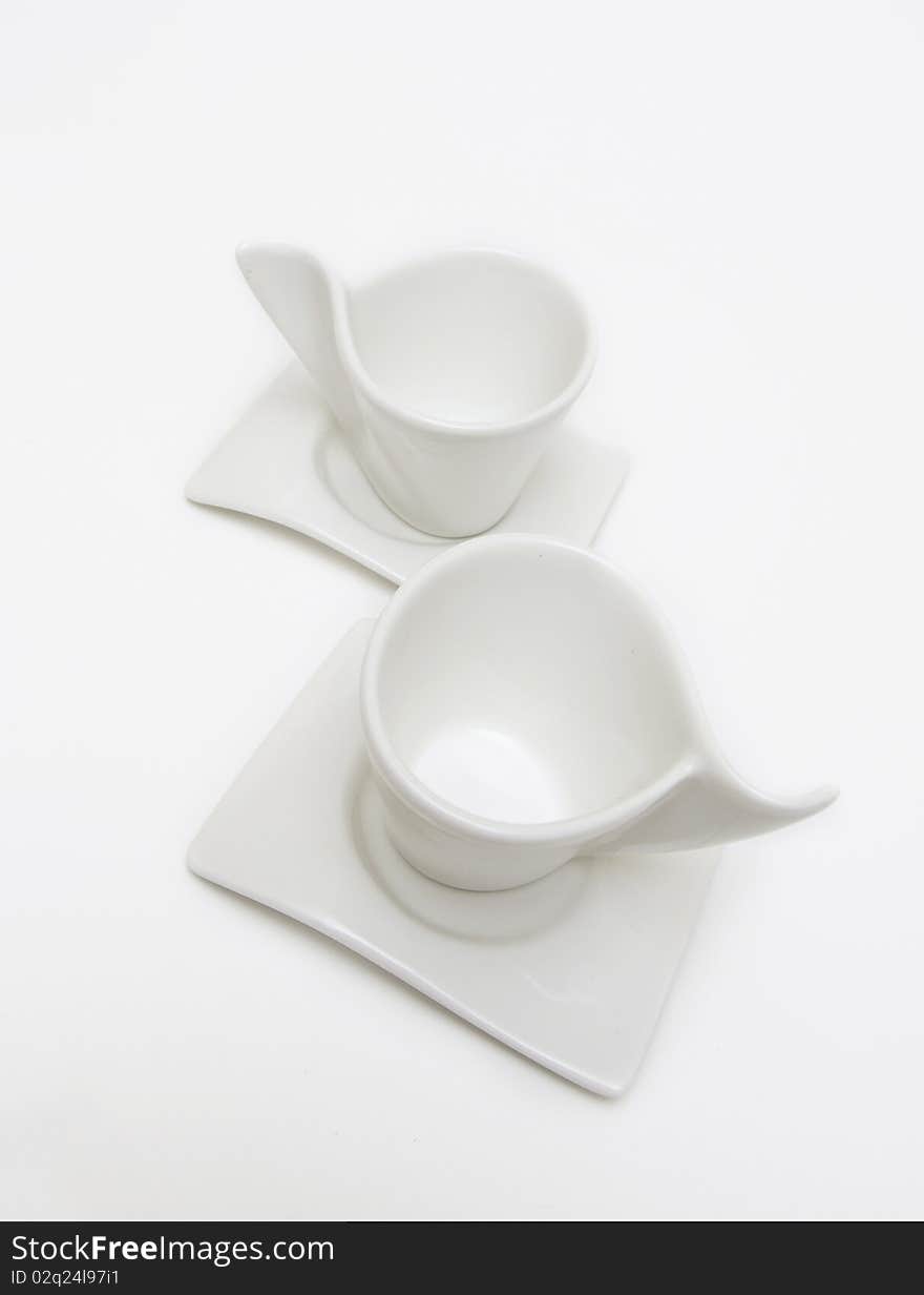 Two white cup for coffee on white background