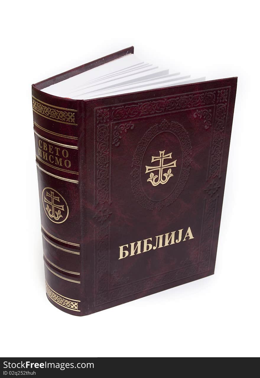 Serbian orthodox bible opened isolated on white