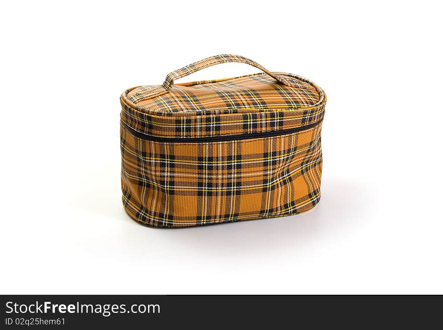 Checkered brown cosmetic bag on a white background