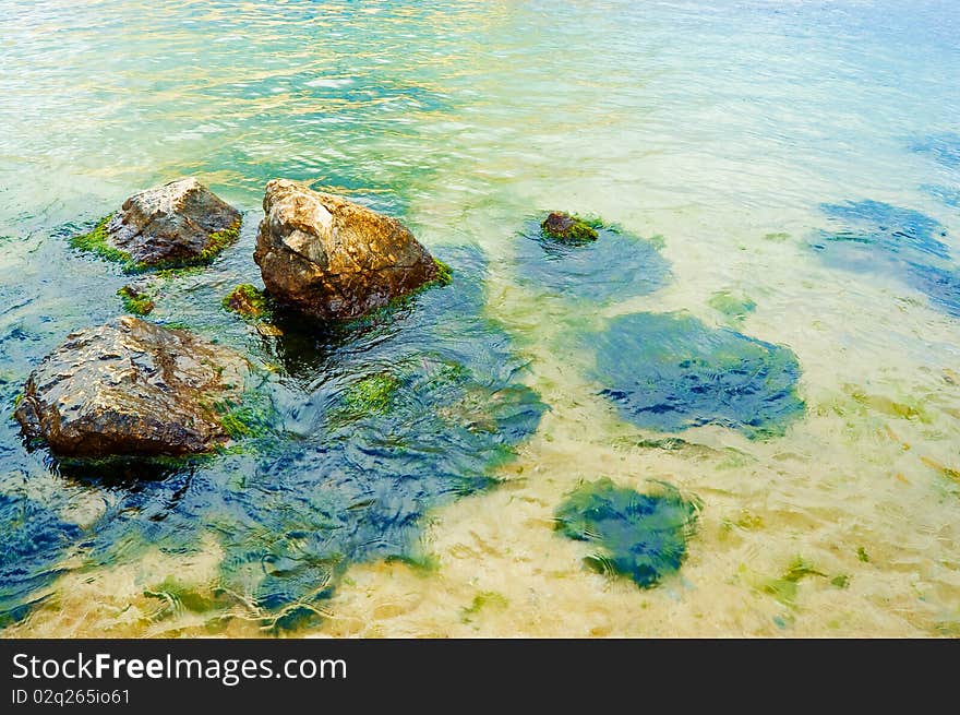 Rocks in pure sea water. Rocks in pure sea water