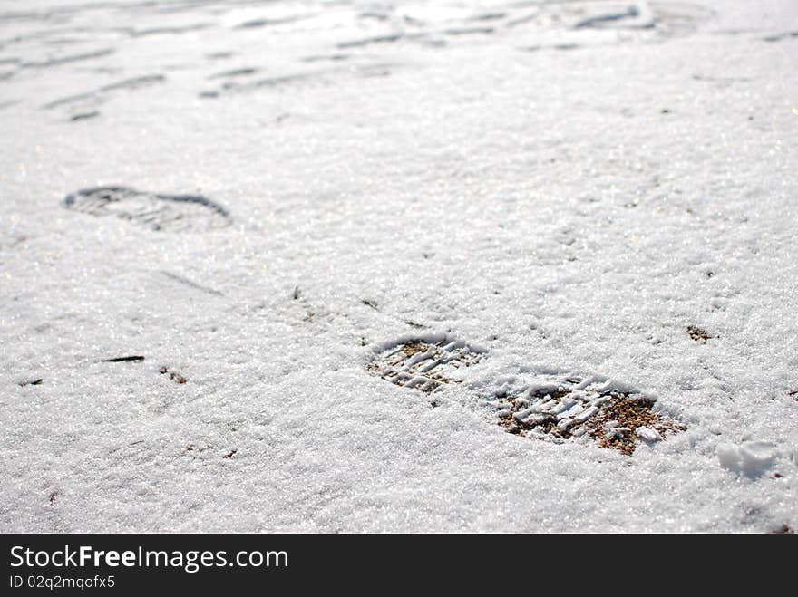 Footprint in snow somewhere in mountains. Footprint in snow somewhere in mountains