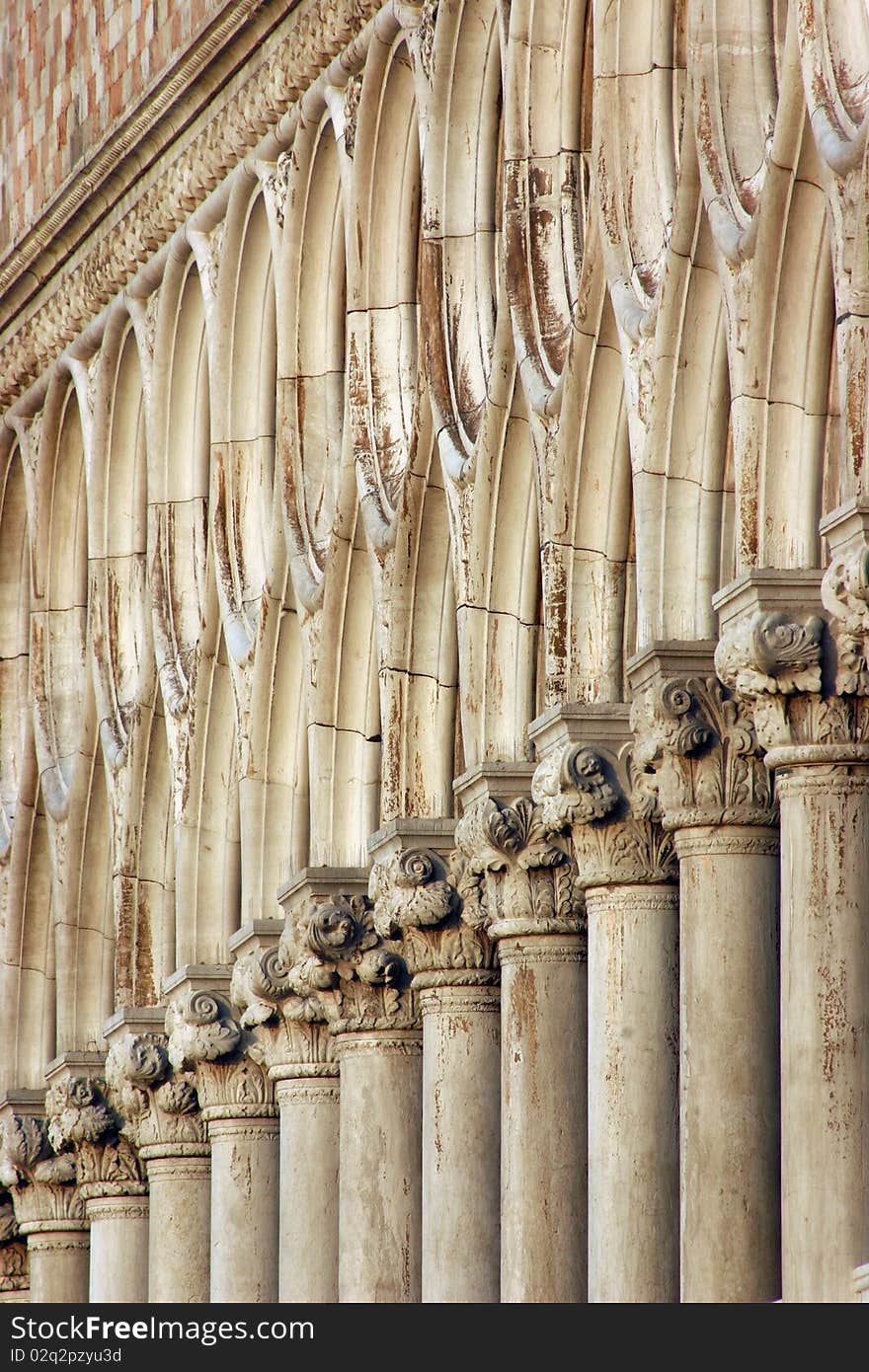 White facade columns of the Doge's Palace in Venice, Italy