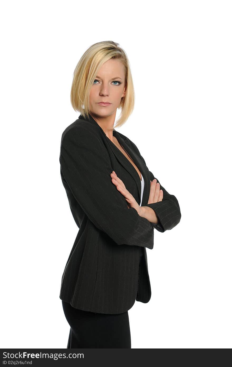 Businesswoman with her arms crossed isolated on a white background. Businesswoman with her arms crossed isolated on a white background