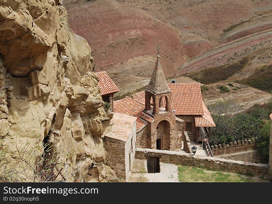 Georgia. David Gareja is a rock-hewn Georgian Orthodox monastery complex located in the Kakheti region of Eastern Georgia, on the half-desert slopes of Mount Gareja, some 60-70 km southeast of Georgia's capital Tbilisi. Georgia. David Gareja is a rock-hewn Georgian Orthodox monastery complex located in the Kakheti region of Eastern Georgia, on the half-desert slopes of Mount Gareja, some 60-70 km southeast of Georgia's capital Tbilisi