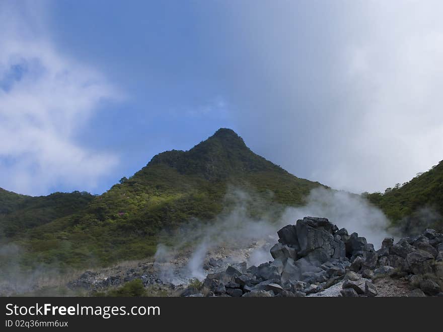 Hakone, Japan. The smelly hot steam is coming from underground thermal springs. Hakone, Japan. The smelly hot steam is coming from underground thermal springs