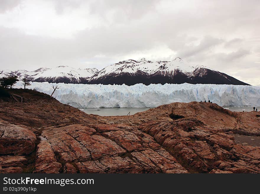 View to the glacier with nearby mountain. View to the glacier with nearby mountain