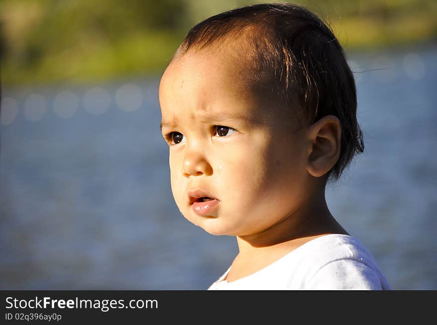 portrait of a boy looking into the distance. portrait of a boy looking into the distance