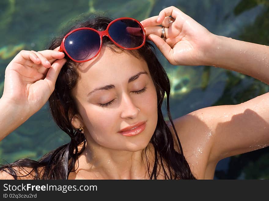 Young Girl In Red Sunglasses