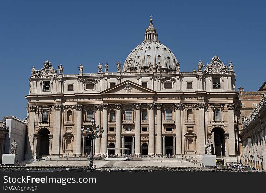 The Sct. Peters Church in Vatical City. in the foreground preparations for at speach by the pope, are being done. The Sct. Peters Church in Vatical City. in the foreground preparations for at speach by the pope, are being done.