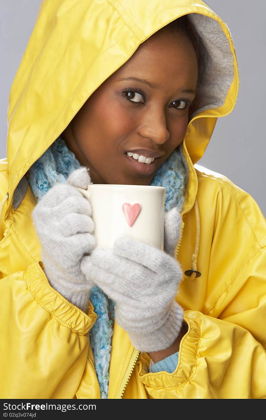 Young Woman Drinking Hot Drink