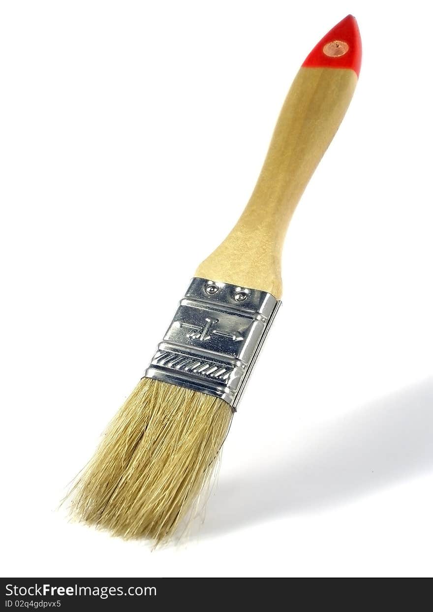 Single paintbrush on the white solid background