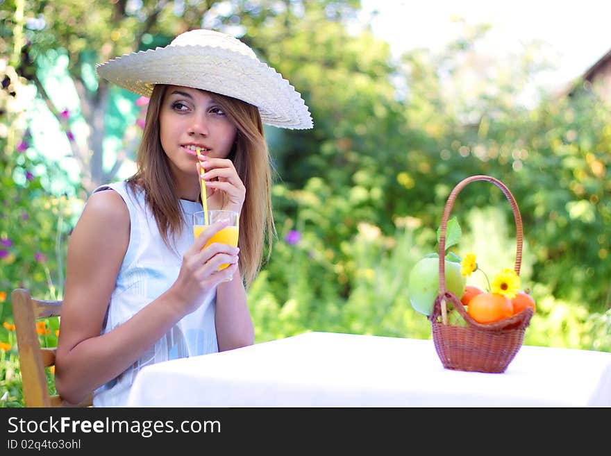 Beautiful girl sitting at the table