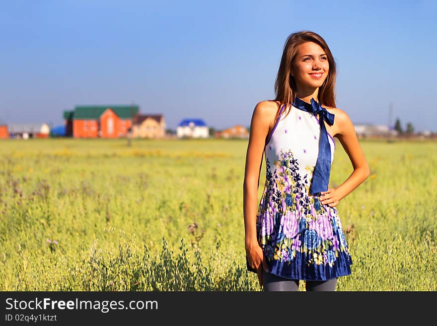 Beautiful girl in a field