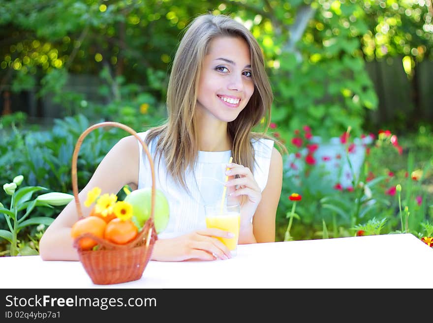 Beautiful girl sitting at the table