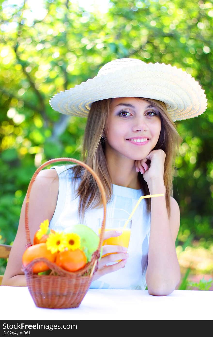 A beautiful girl sitting at the table