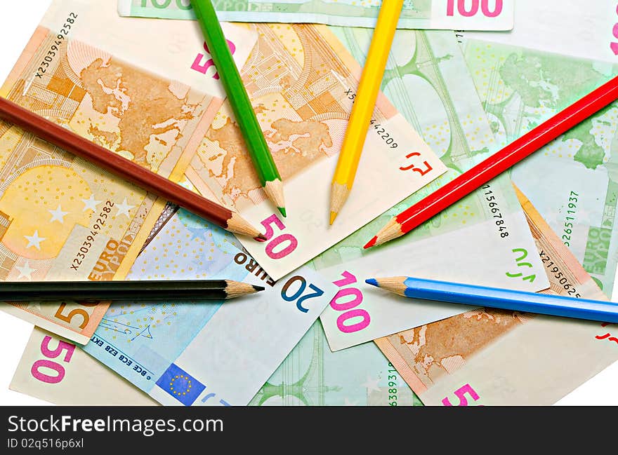 Colored pencils on a euro. Colored pencils on a euro.