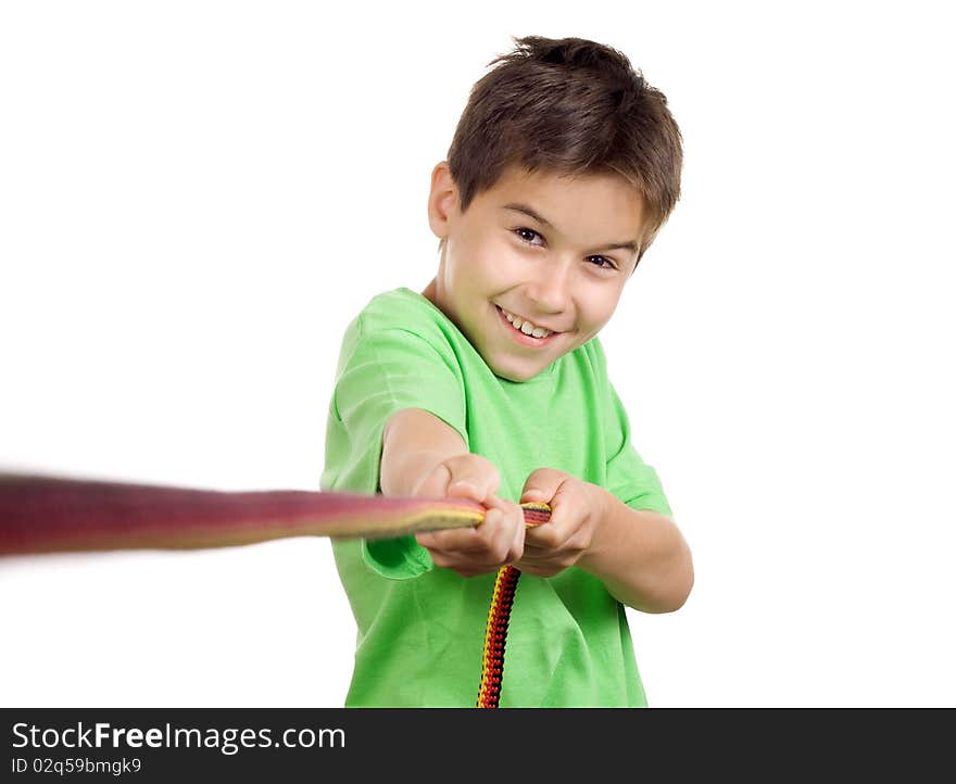 Boy pulling a rope - isolated on white