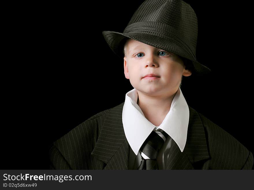 Cute Boy With Tie And Hat