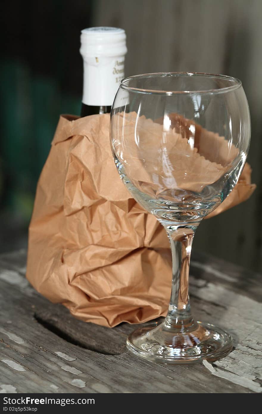 Image of a glass and bottle of wine. Image of a glass and bottle of wine