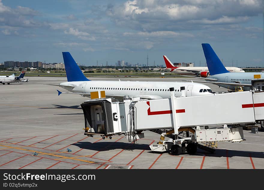 Airplane near the terminal in an airport