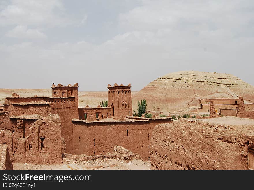 Rooftops and decorative towers in the ancient city of Ait Benhaddou. Rooftops and decorative towers in the ancient city of Ait Benhaddou