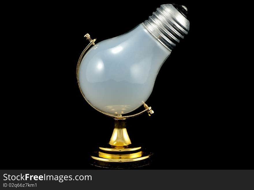 Studio shot of the light bulb on the globe holder. Studio shot of the light bulb on the globe holder...