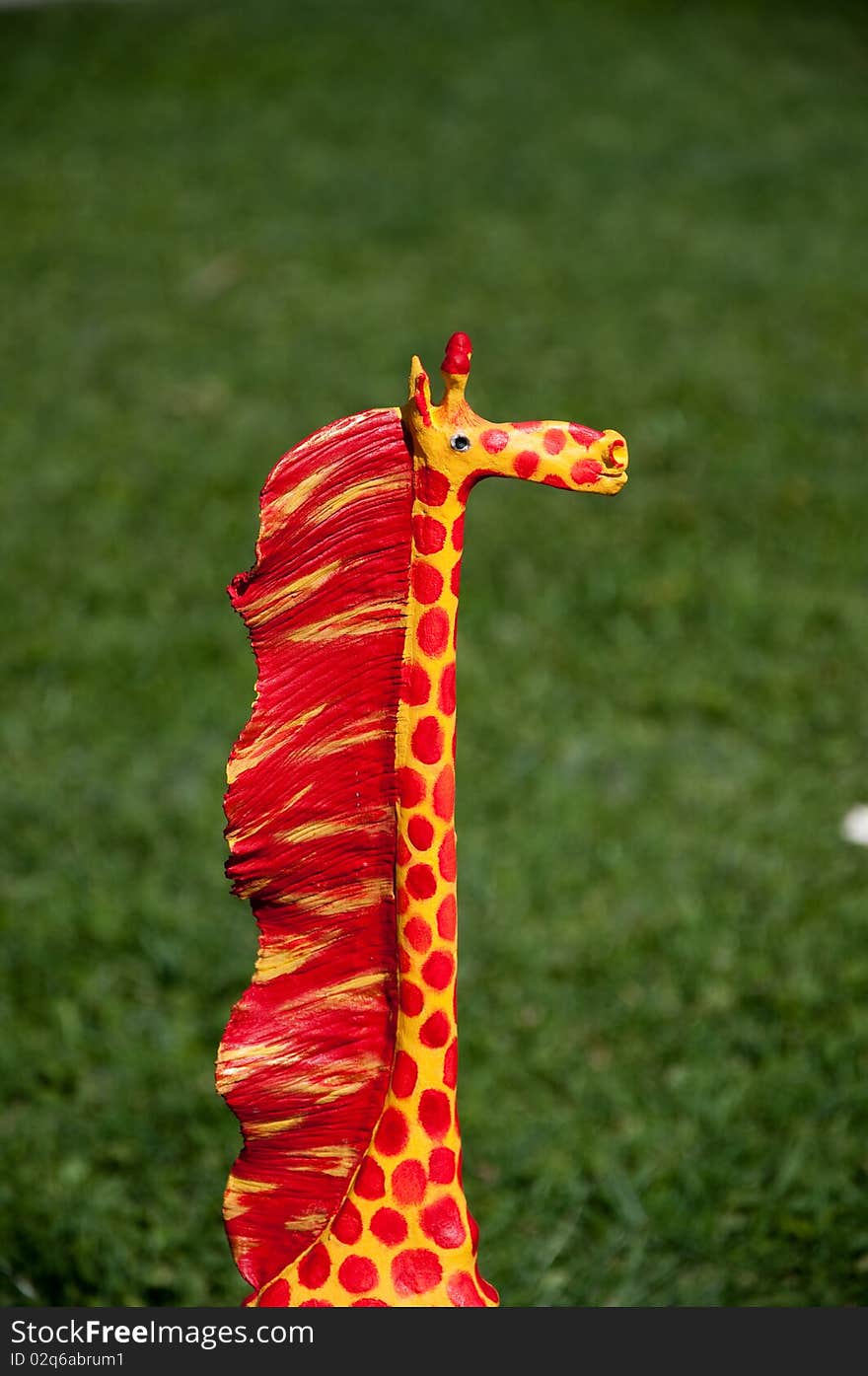 Giraffe of wood of adornment in the garden