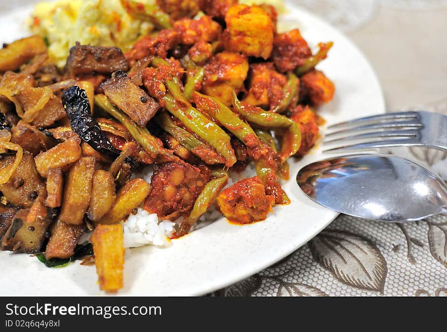 Spicy Malay set meal with variety of vegetables. For concepts such as food and beverage, healthy eating, and diet and nutrition.