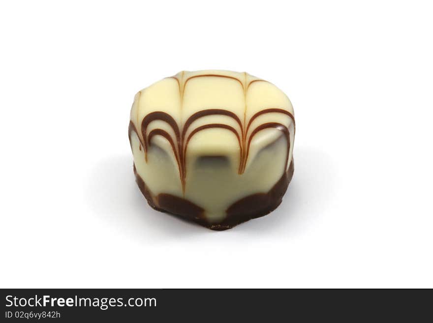 Chocolate praline on white background - Schokoladenpraline vor weissem Hintergrund.