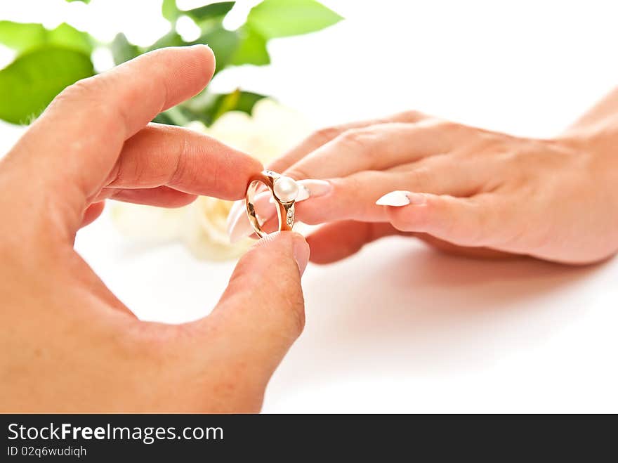 Man's and woman's hands with golden ring. Man's and woman's hands with golden ring