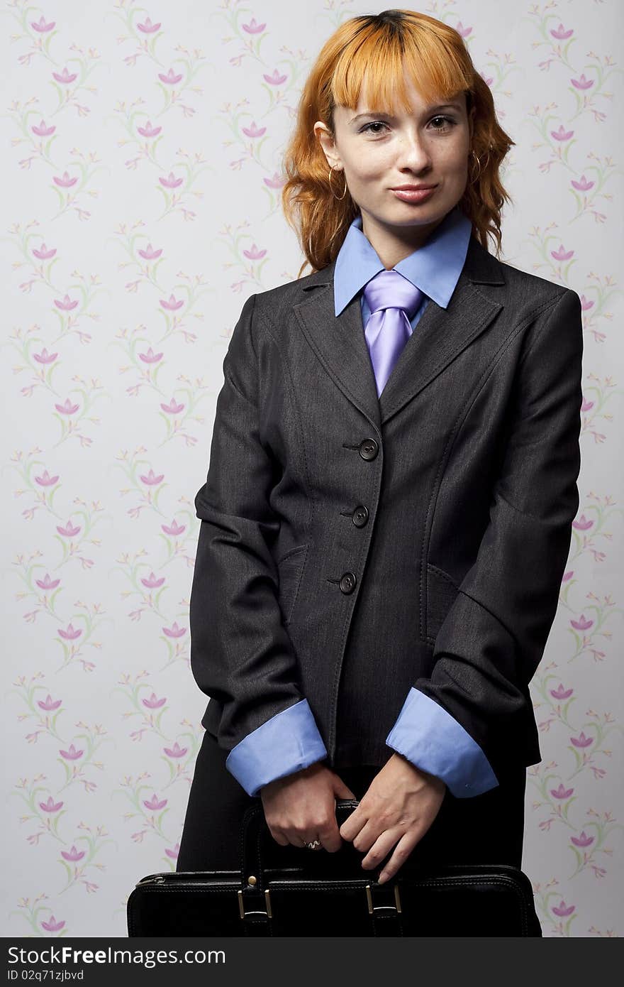 Portrait of the student against a flower wall. Portrait of the student against a flower wall