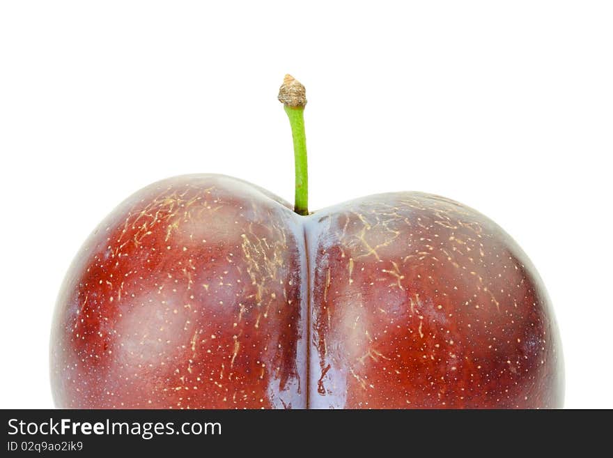 Fresh ripe twinned plum isolated on white