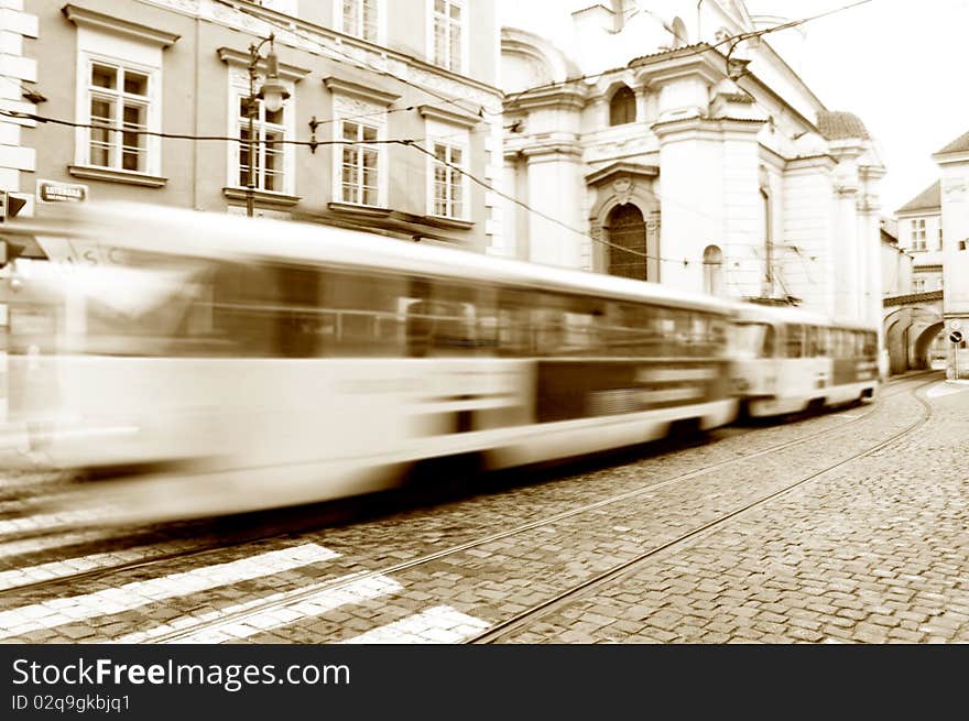 Old tram on Prague street. Motion picture in sepia. Old tram on Prague street. Motion picture in sepia.
