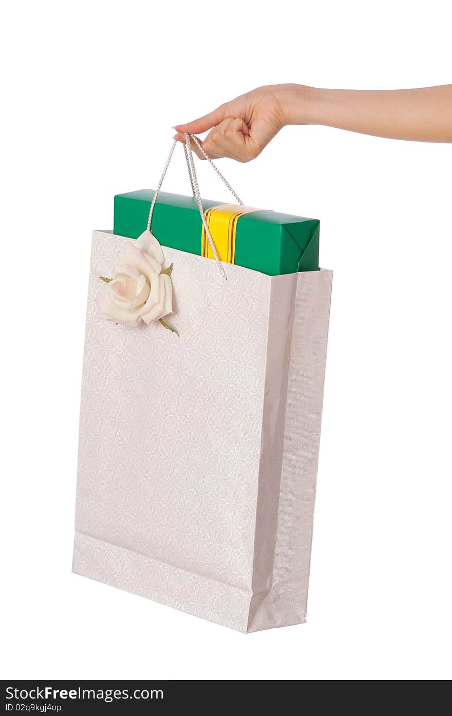 Paper bag with gifts from the supermarket